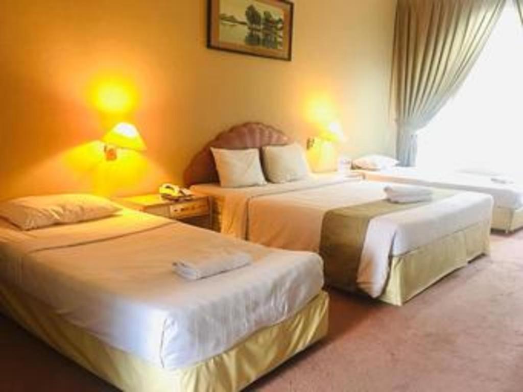 New Grand Park Hotel Surabaya Esterno foto